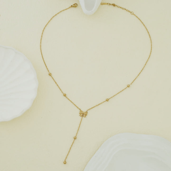 Ivanka Ribbon + Golden Ball Neckpiece