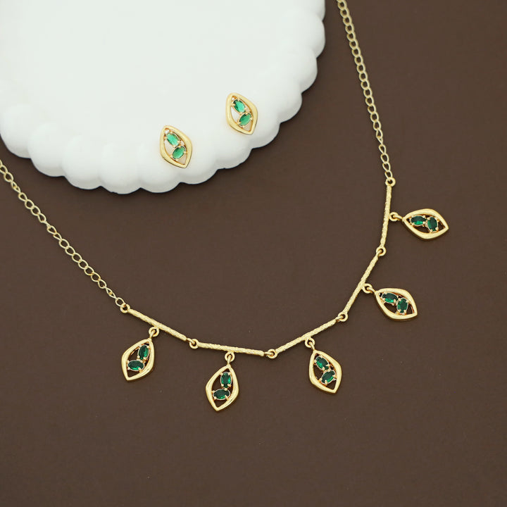 Golden Hammered Stick Glossy Eye Shaped Neckpiece With Earring