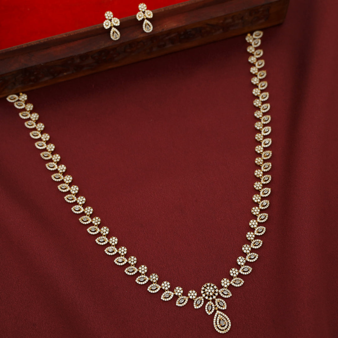 Ansruta  Sayali Floral AD Stone Long neckpiece With Earring