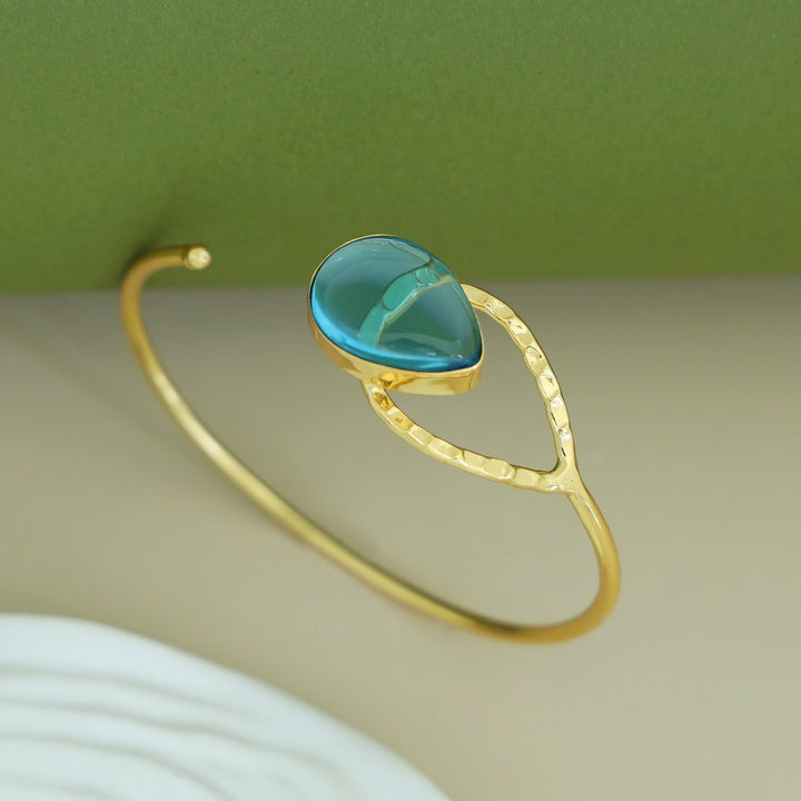 Madhurima Golden Glossy Drop Bangle