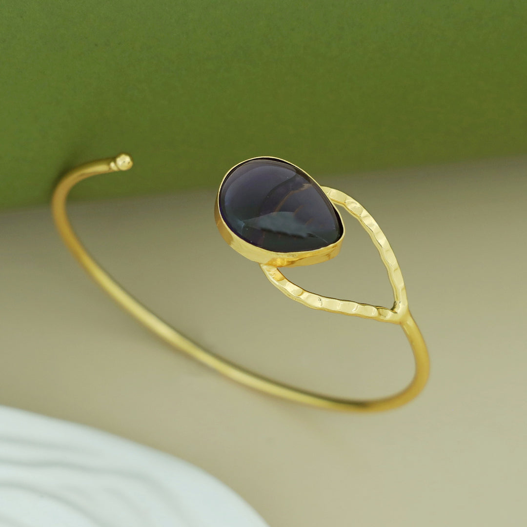 Madhurima Golden Glossy Drop Bangle