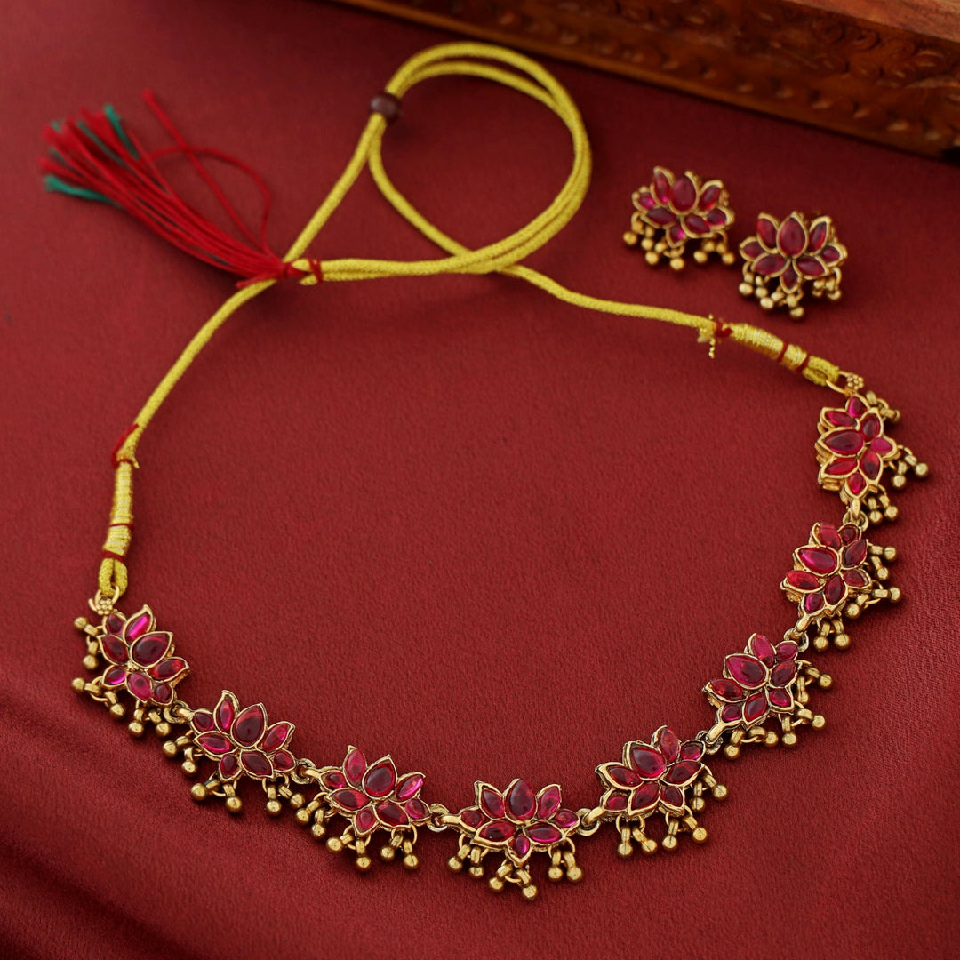 Anshika Golden Beads Lotus Neckpiece With Earring