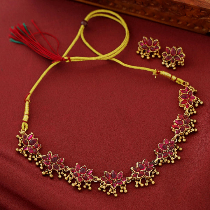 Anshika Golden Beads Lotus Neckpiece With Earring