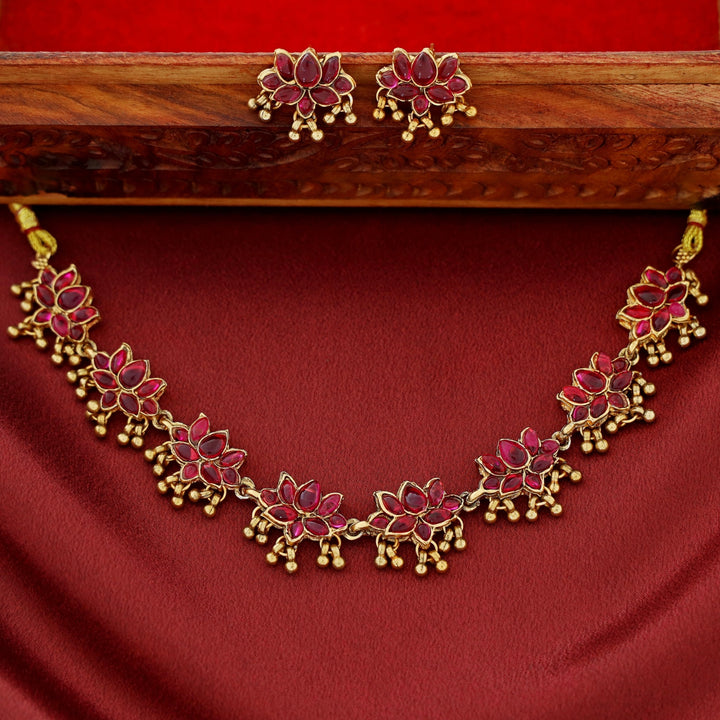 Anshika Golden Beads Lotus Neckpiece With Earring