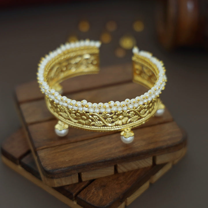 Sharvani Cluster Pearl Golden Flower Hand Cuff