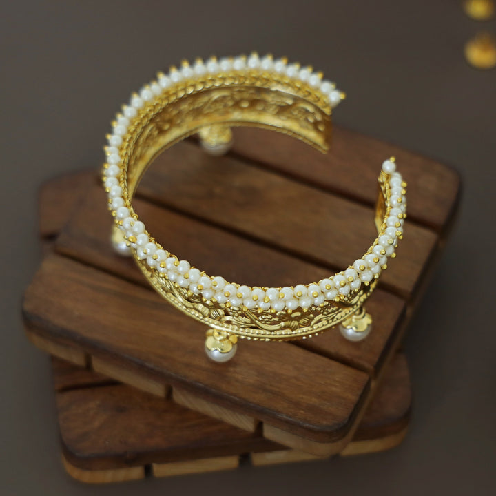 Sharvani Cluster Pearl Golden Flower Hand Cuff