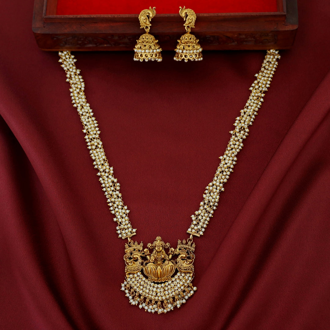 Takshika Devi Mayura Cluster Pearl Long Haram Neckpiece With Earring