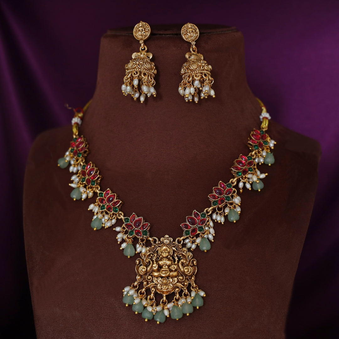 Anshika Pearl Lotus Devi Pendant Neckpiece With Earring