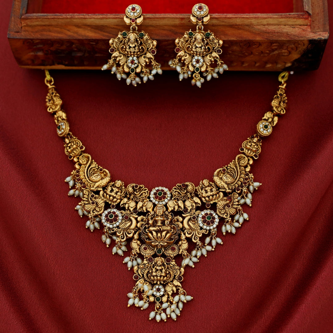 Akilandeswari Mayura Rice Pearl Neckpiece With Earring