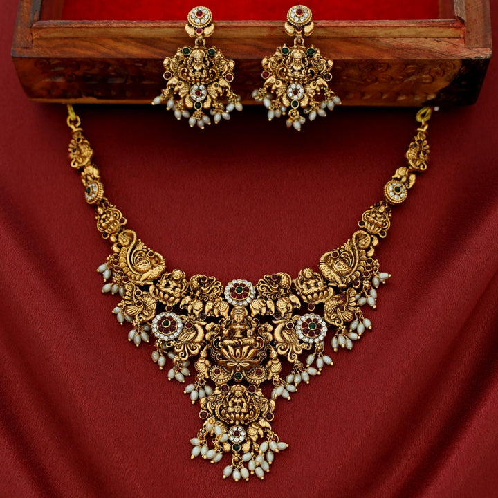Akilandeswari Mayura Rice Pearl Neckpiece With Earring