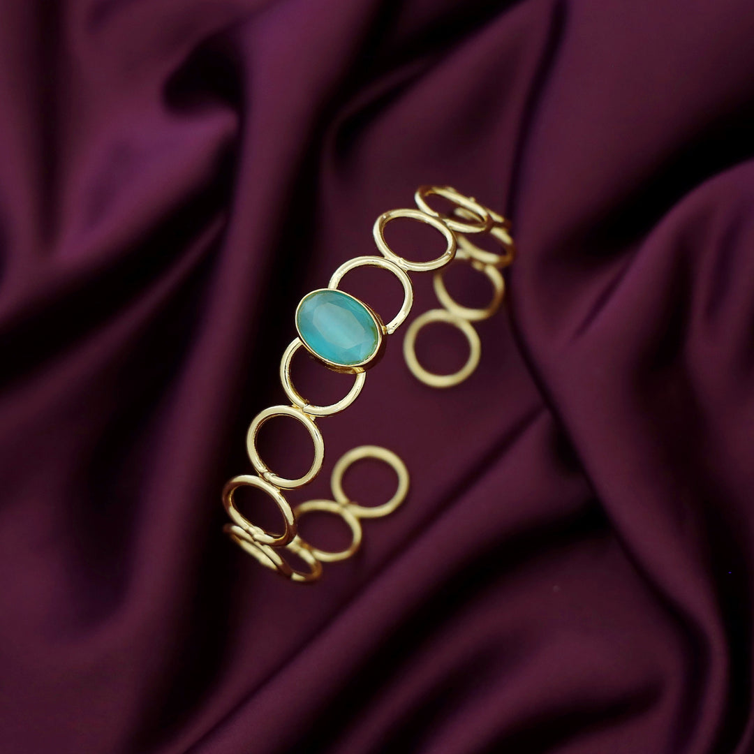 Doyel Golden Circle Oval Glossy Stone Bangle