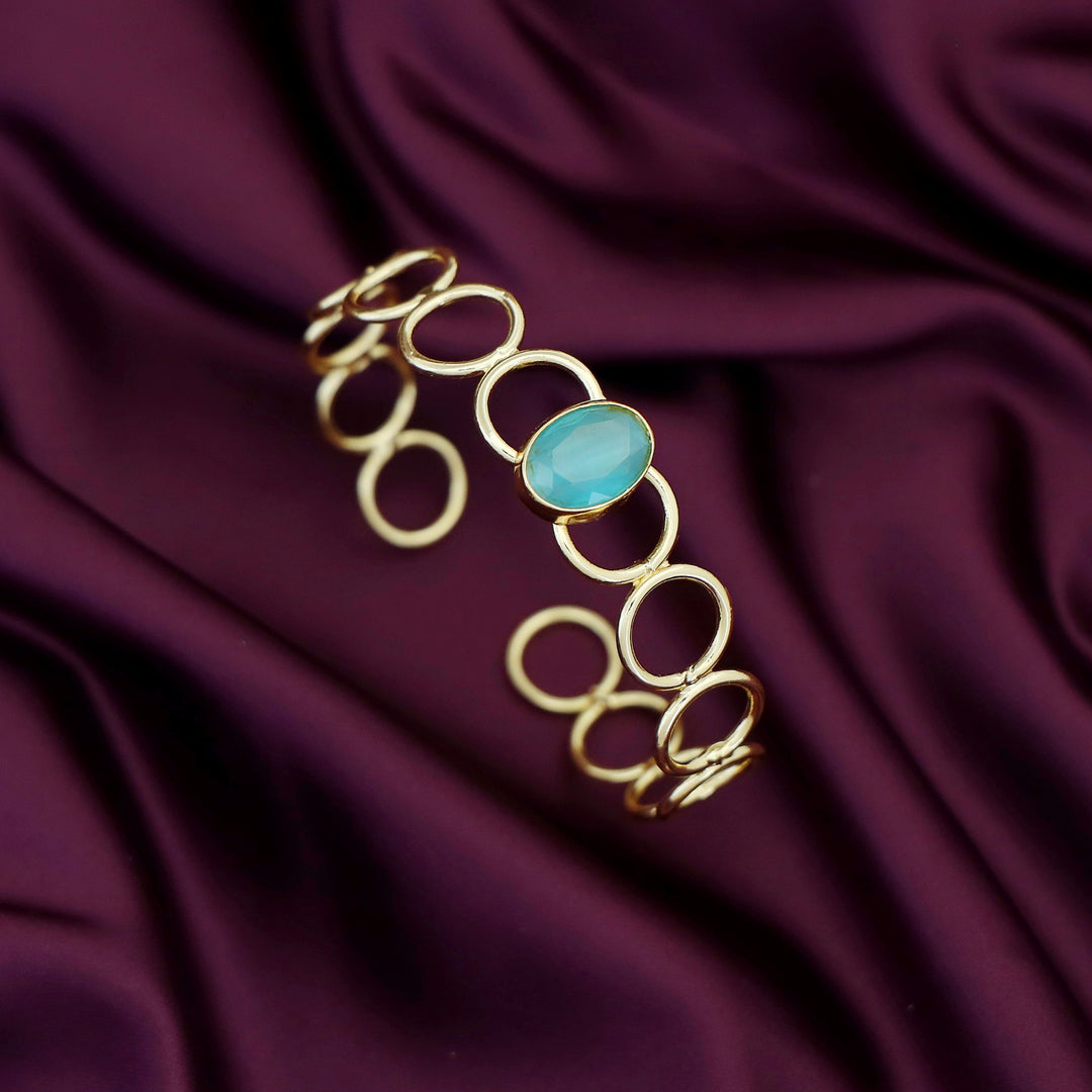 Doyel Golden Circle Oval Glossy Stone Bangle