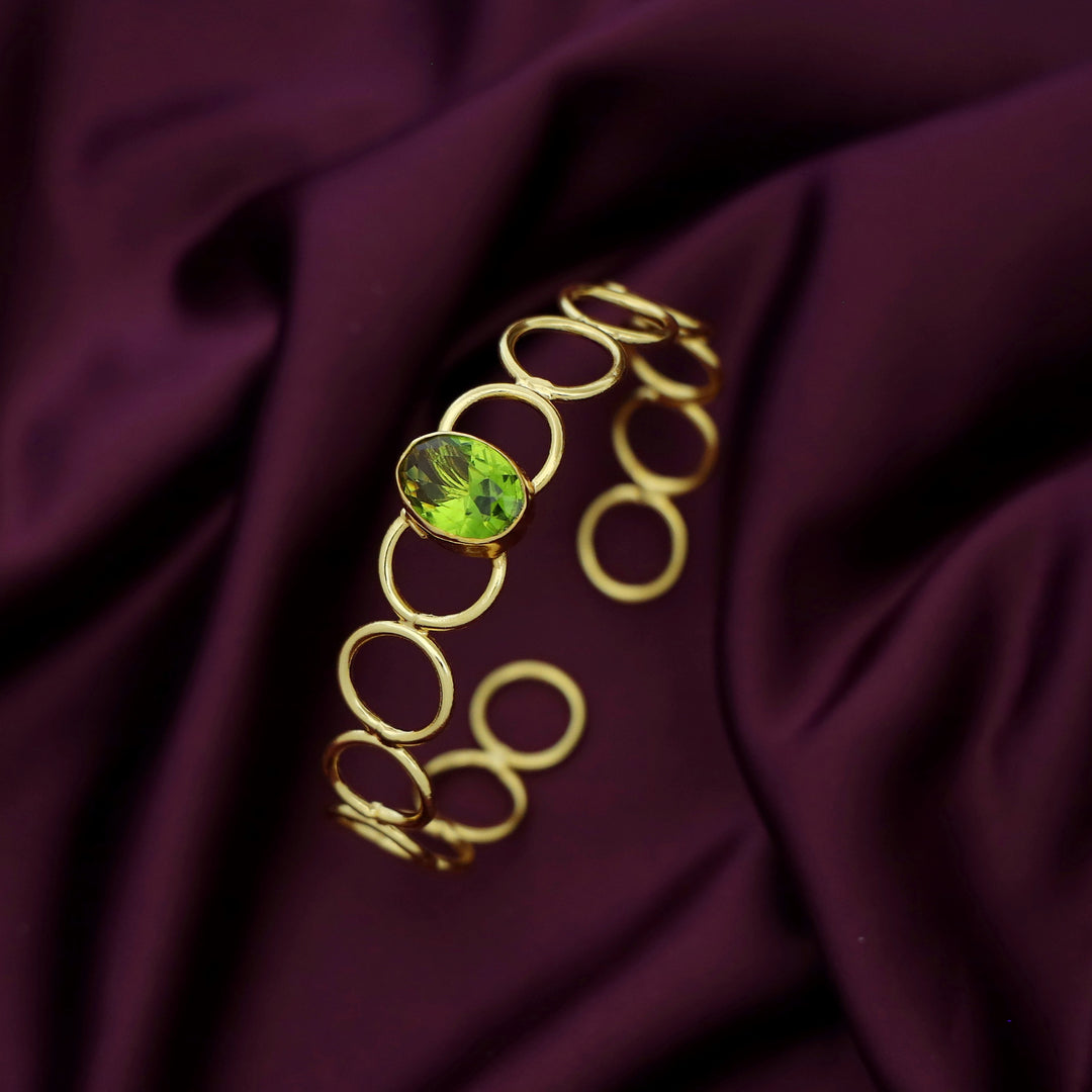 Doyel Golden Circle Oval Glossy Stone Bangle