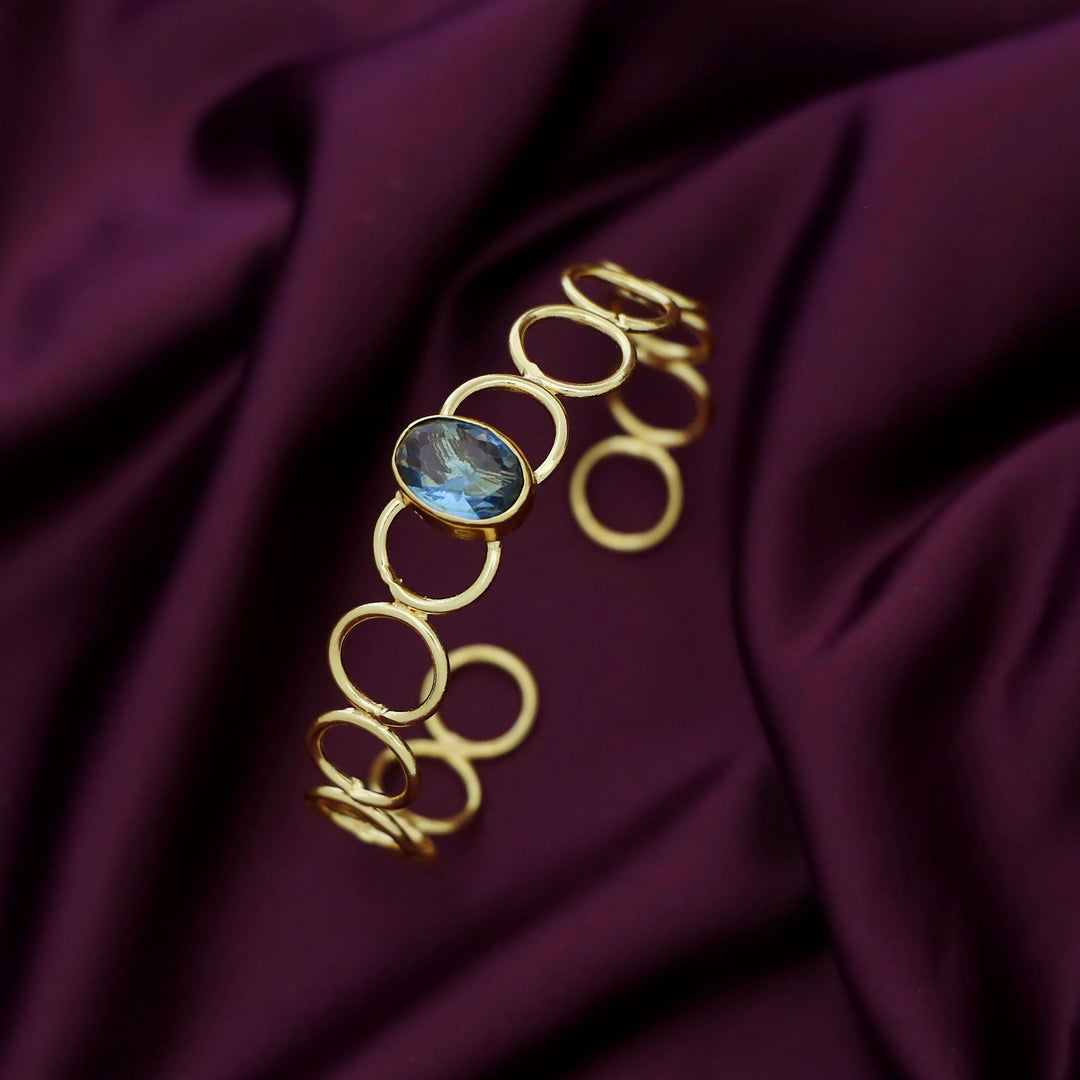 Doyel Golden Circle Oval Glossy Stone Bangle