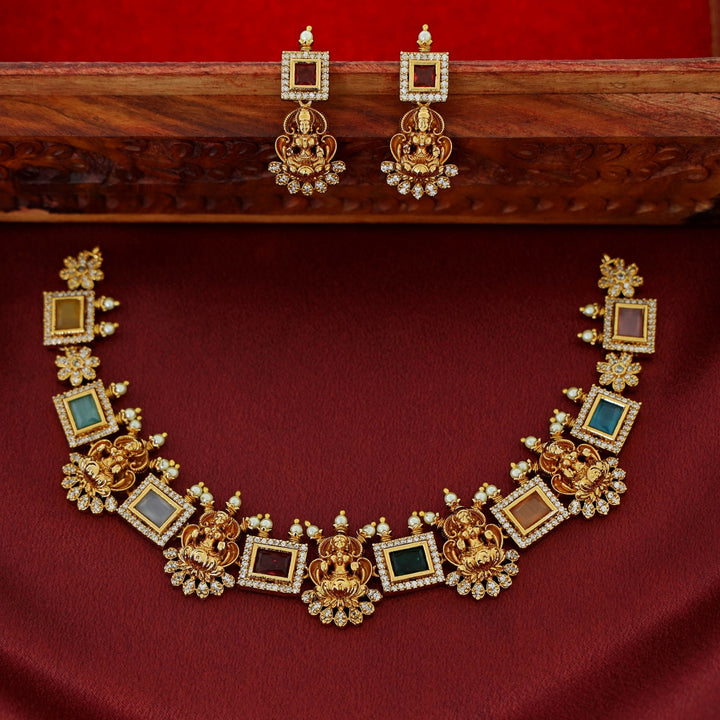 Aiswaryalekshmi Golden Stoned Rectangular Neckpiece With Earring