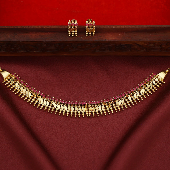 Nidhisha Golden Elakkathali Choker With Earring