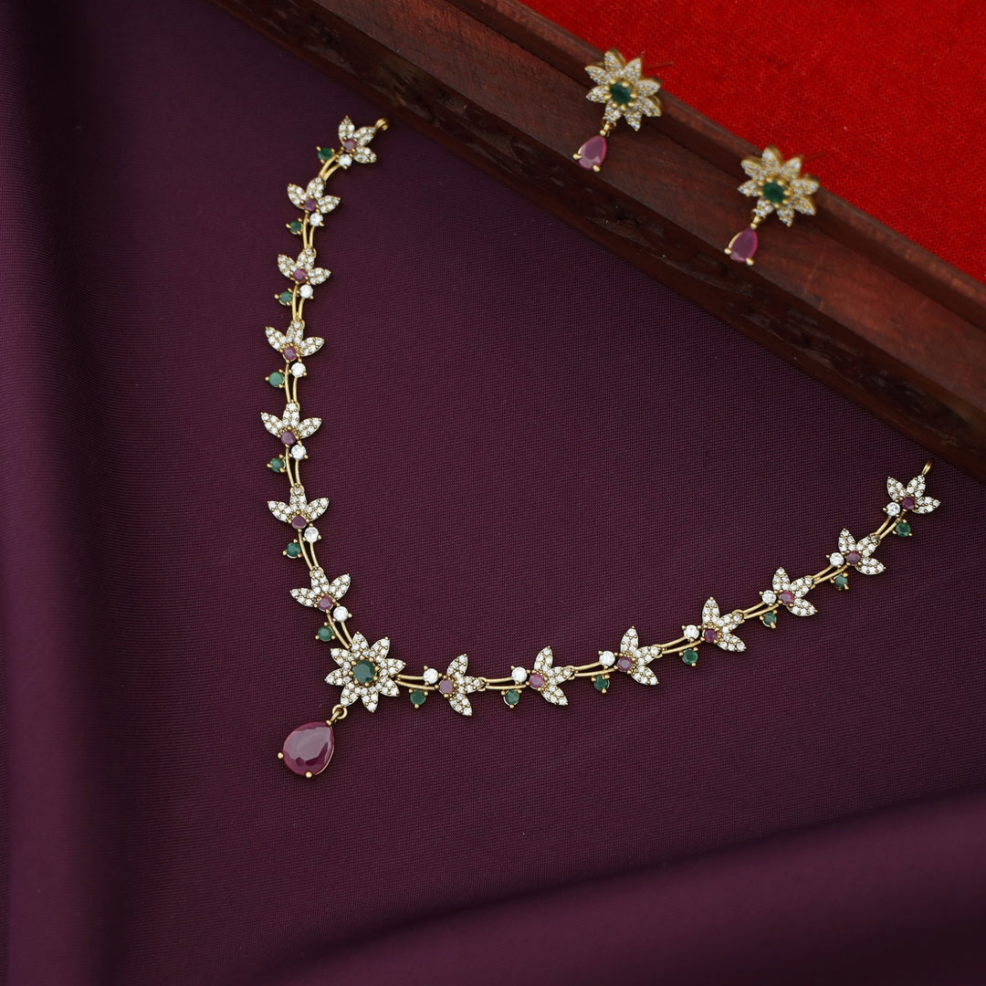 Asmita AD Stone Flower Glossy Drop With Earring