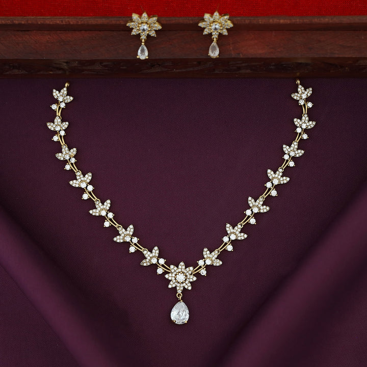 Asmita AD Stone Flower Glossy Drop With Earring