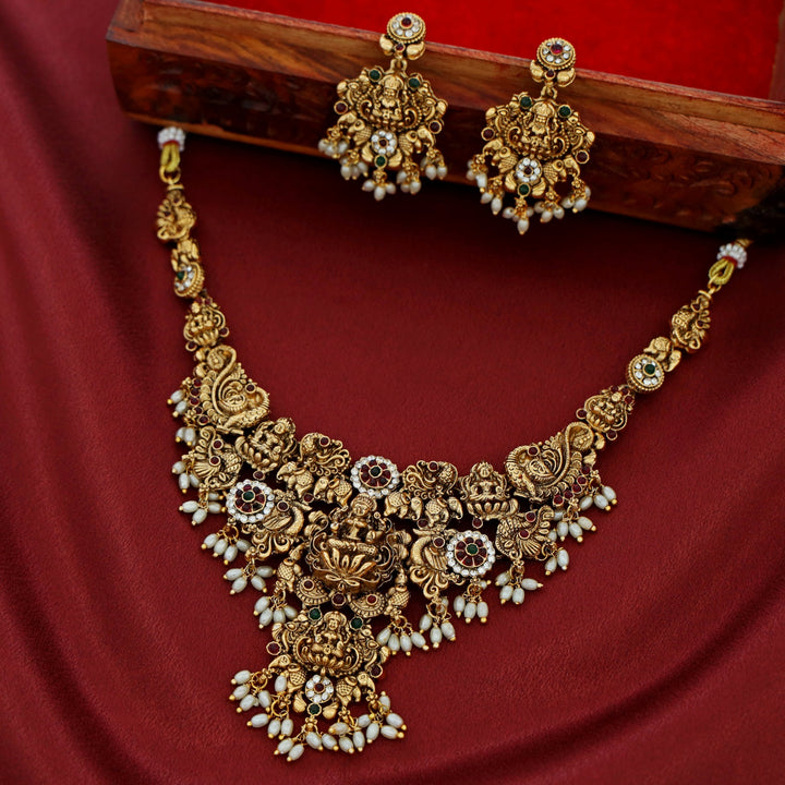 Akilandeswari Mayura Rice Pearl Neckpiece With Earring