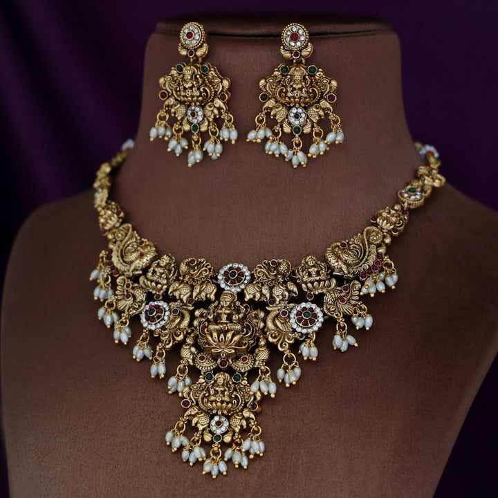Akilandeswari Mayura Rice Pearl Neckpiece With Earring