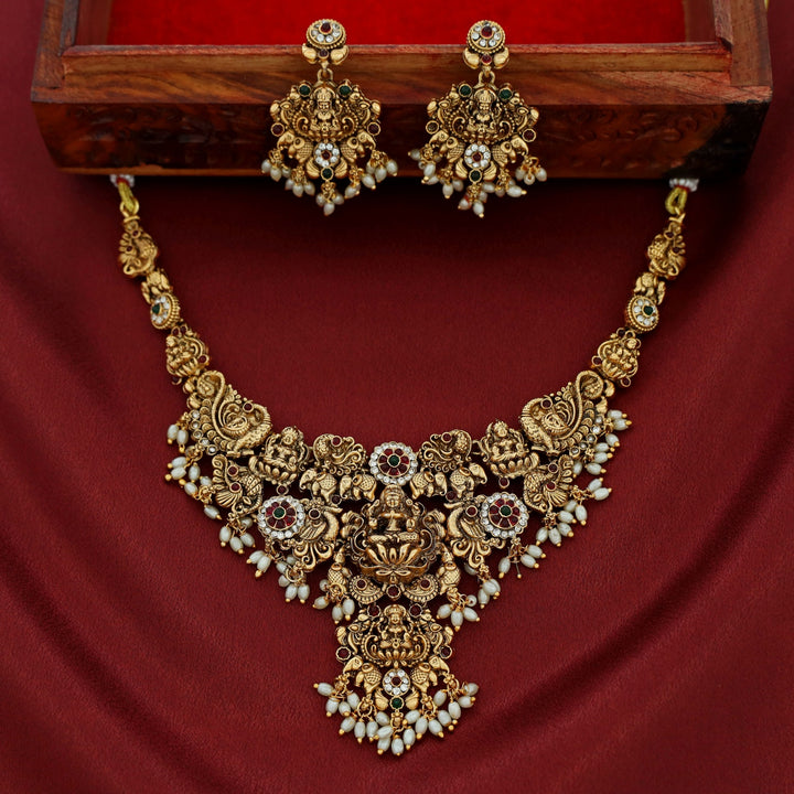 Akilandeswari Mayura Rice Pearl Neckpiece With Earring