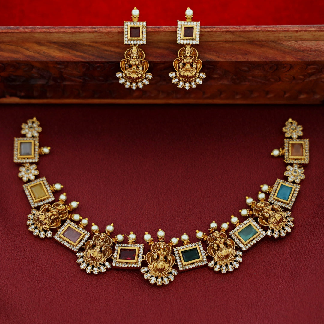 Aiswaryalekshmi Golden Stoned Rectangular Neckpiece With Earring