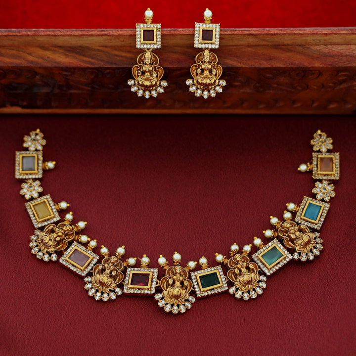 Aiswaryalekshmi Golden Stoned Rectangular Neckpiece With Earring