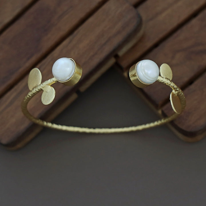 Hamsini Golden Glossy Stone Bangle