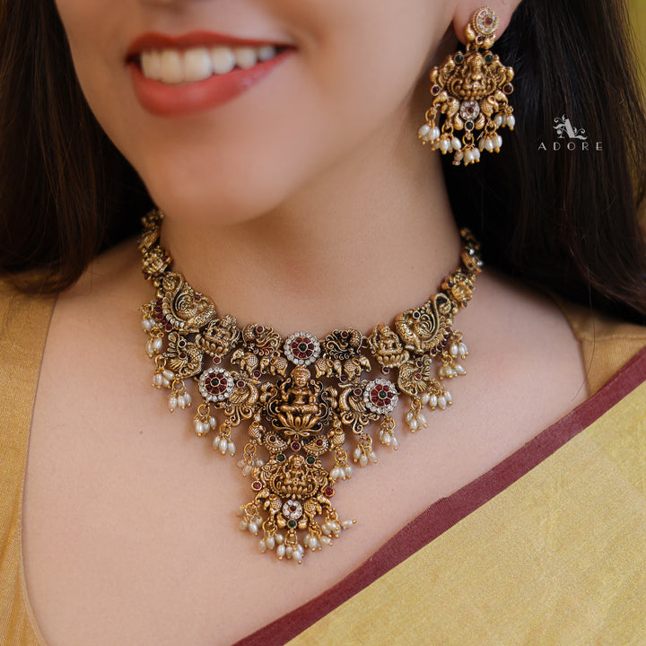 Akilandeswari Mayura Rice Pearl Neckpiece With Earring