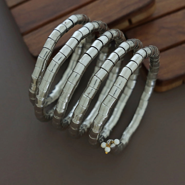 Nacala Dual Tone Spiral Bangle