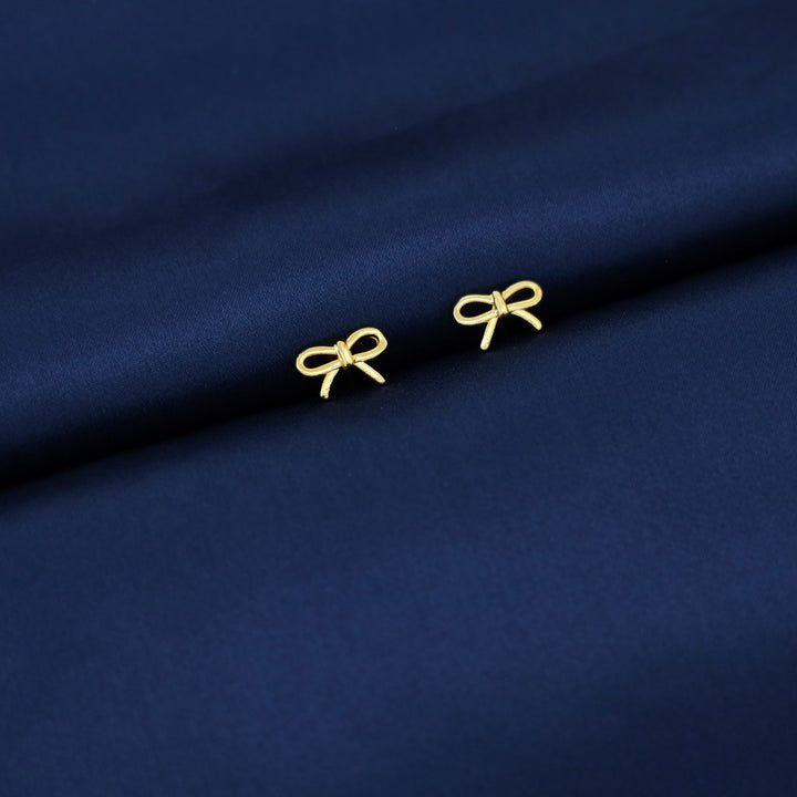 Emire Golden Ribbon Stud