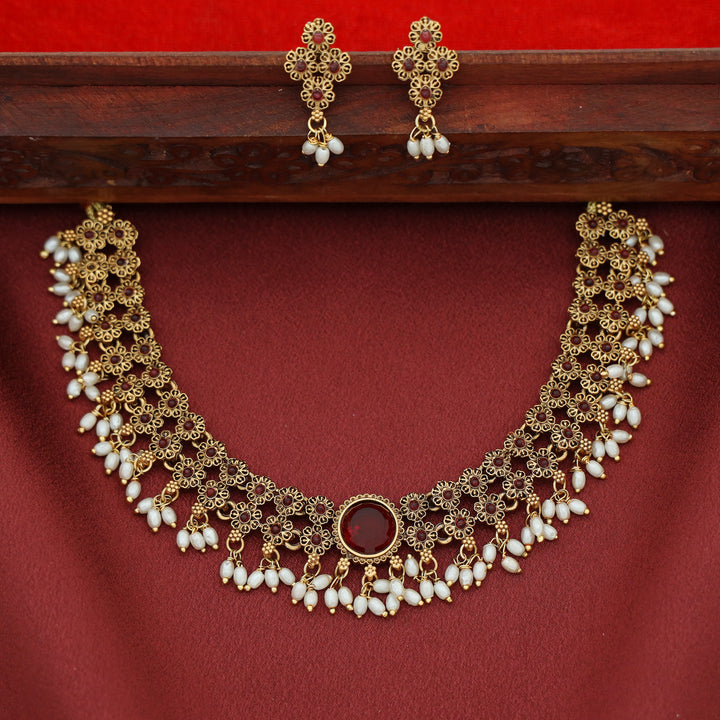 Nivithika Floral Rice Pearl Short Neckpiece with Earring