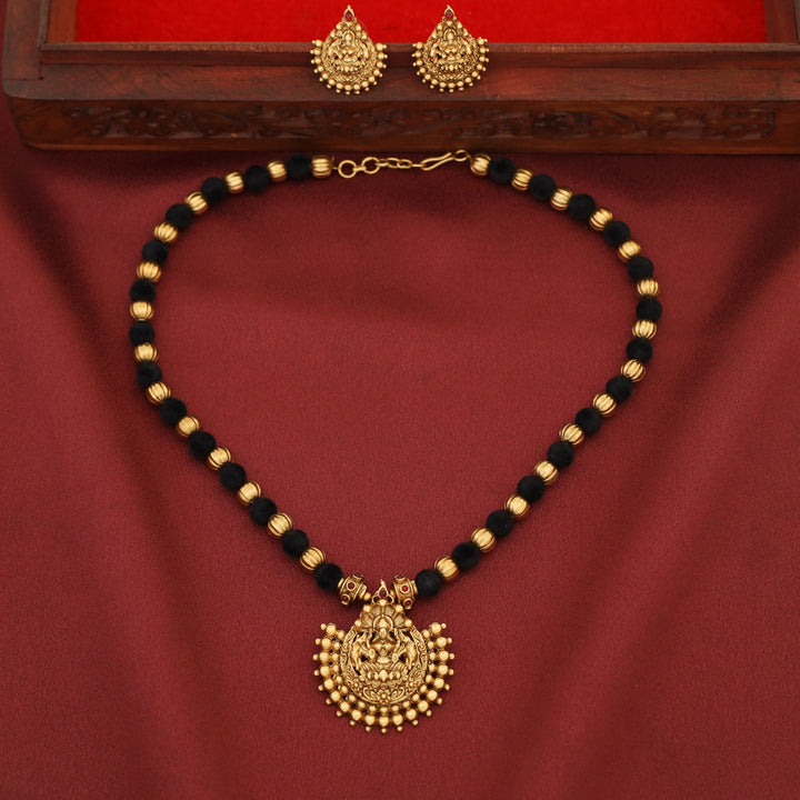 Anandalakshmi Golden Velvet Ball Neckpiece With Earring