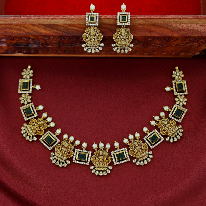 Aiswaryalekshmi Golden Stoned Rectangular Neckpiece With Earring