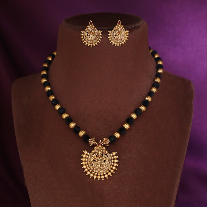 Anandalakshmi Golden Velvet Ball Neckpiece With Earring