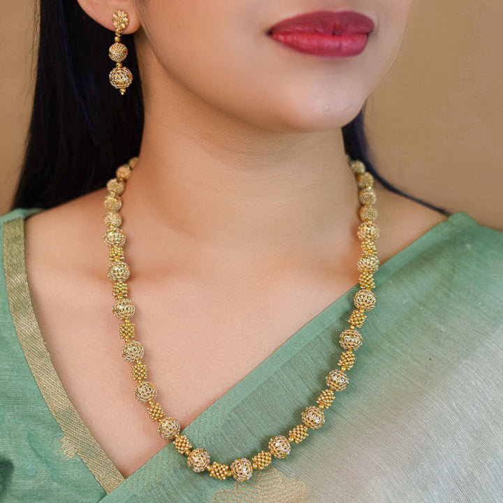 Aradhita Golden Ball Neckpiece With Earring