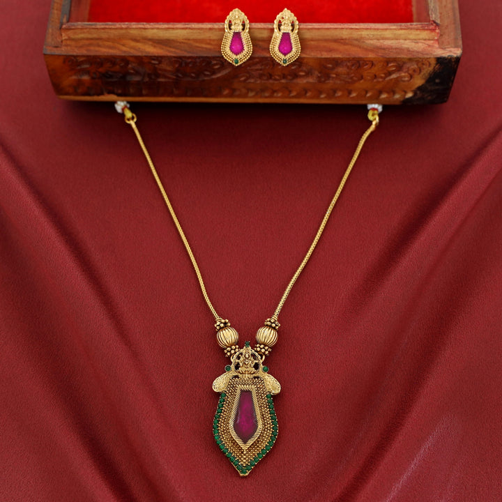 Varenya Nagapadam Palakka Pendant Neckpiece With Earring