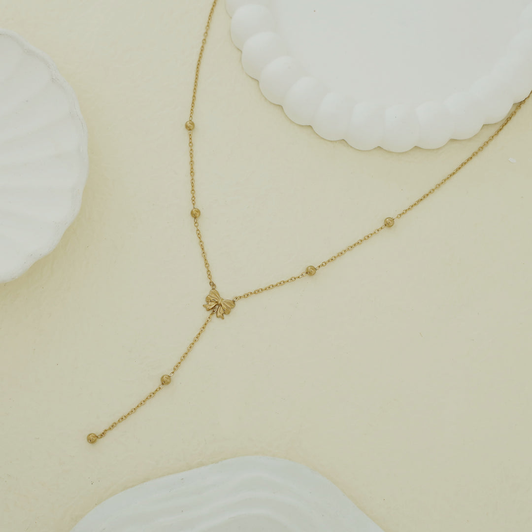 Ivanka Ribbon + Golden Ball Neckpiece