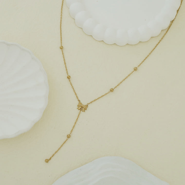 Ivanka Ribbon + Golden Ball Neckpiece