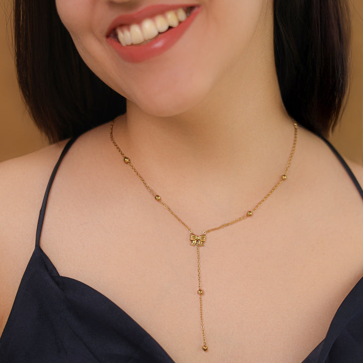 Ivanka Ribbon + Golden Ball Neckpiece