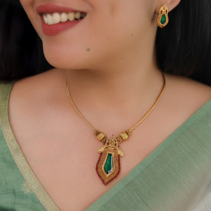 Varenya Nagapadam Palakka Pendant Neckpiece With Earring